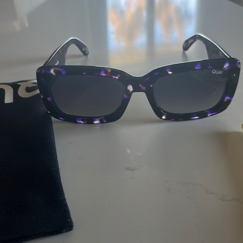Quay sunglasses. Torrid she’ll with purple accents.